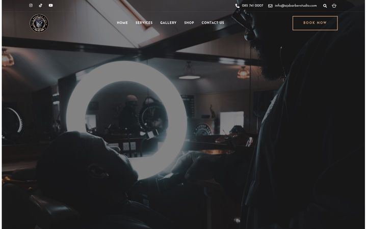 Screenshot of ajsbarberstudio.com