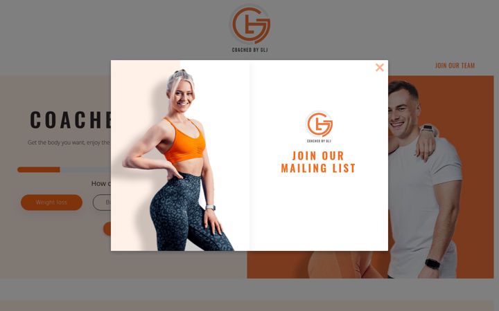 Screenshot of coachedbyglj.com