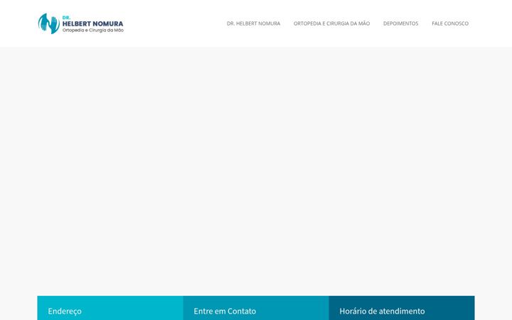 Screenshot stránky drhelbertnomura.com.br