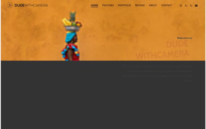 Screenshot of dudewithcamera.com