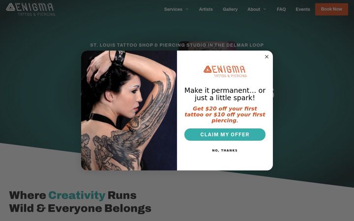 Screenshot of enigmatattoos.com