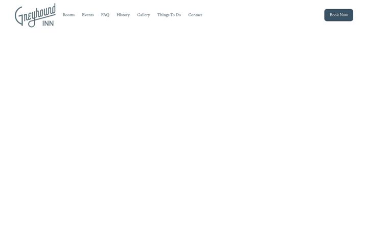 Screenshot of greyhoundinntx.com