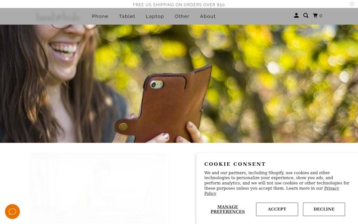 Screenshot of handandhide.com