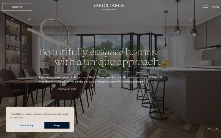 Screenshot of jakobjamesdesignerhomes.com