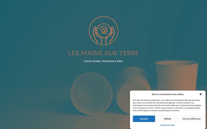 Screenshot of lesmainssurterre.com