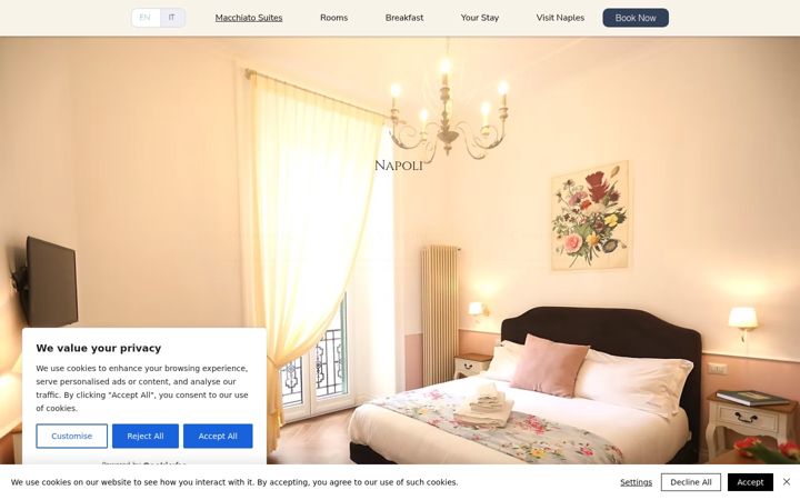 Screenshot of macchiatosuitesnaples.com