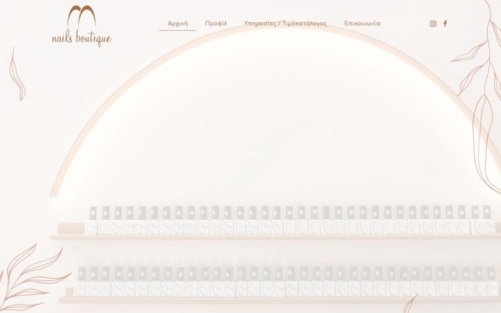 Screenshot of manosnailsboutique.com